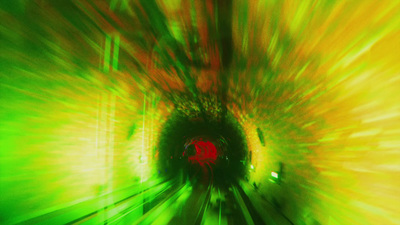 a train traveling through a tunnel filled with green and red lights