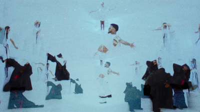 a group of people standing in the snow