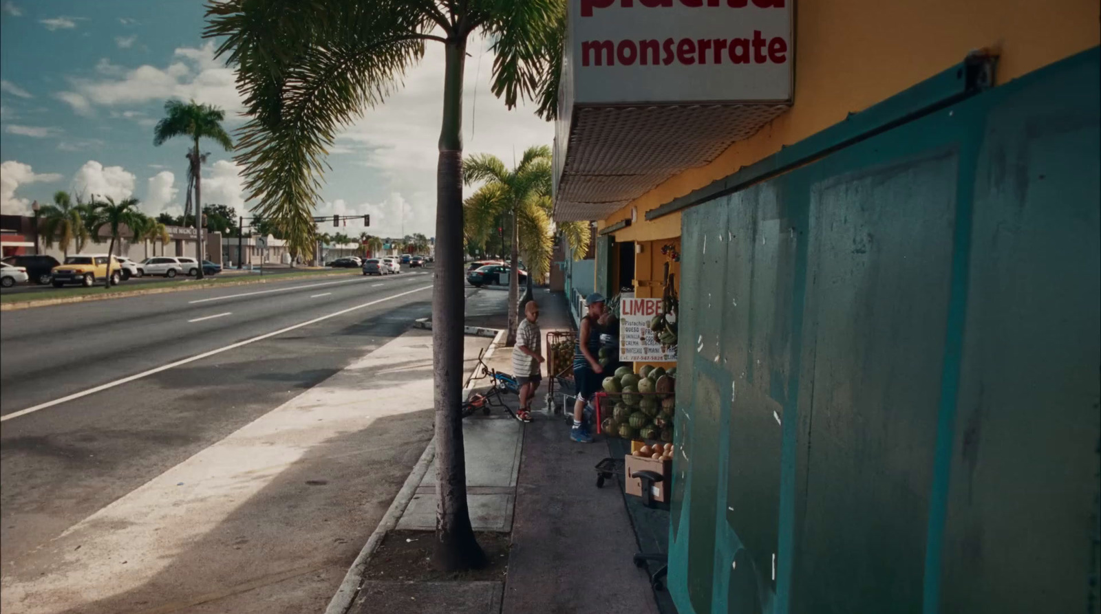 a group of people standing outside of a store