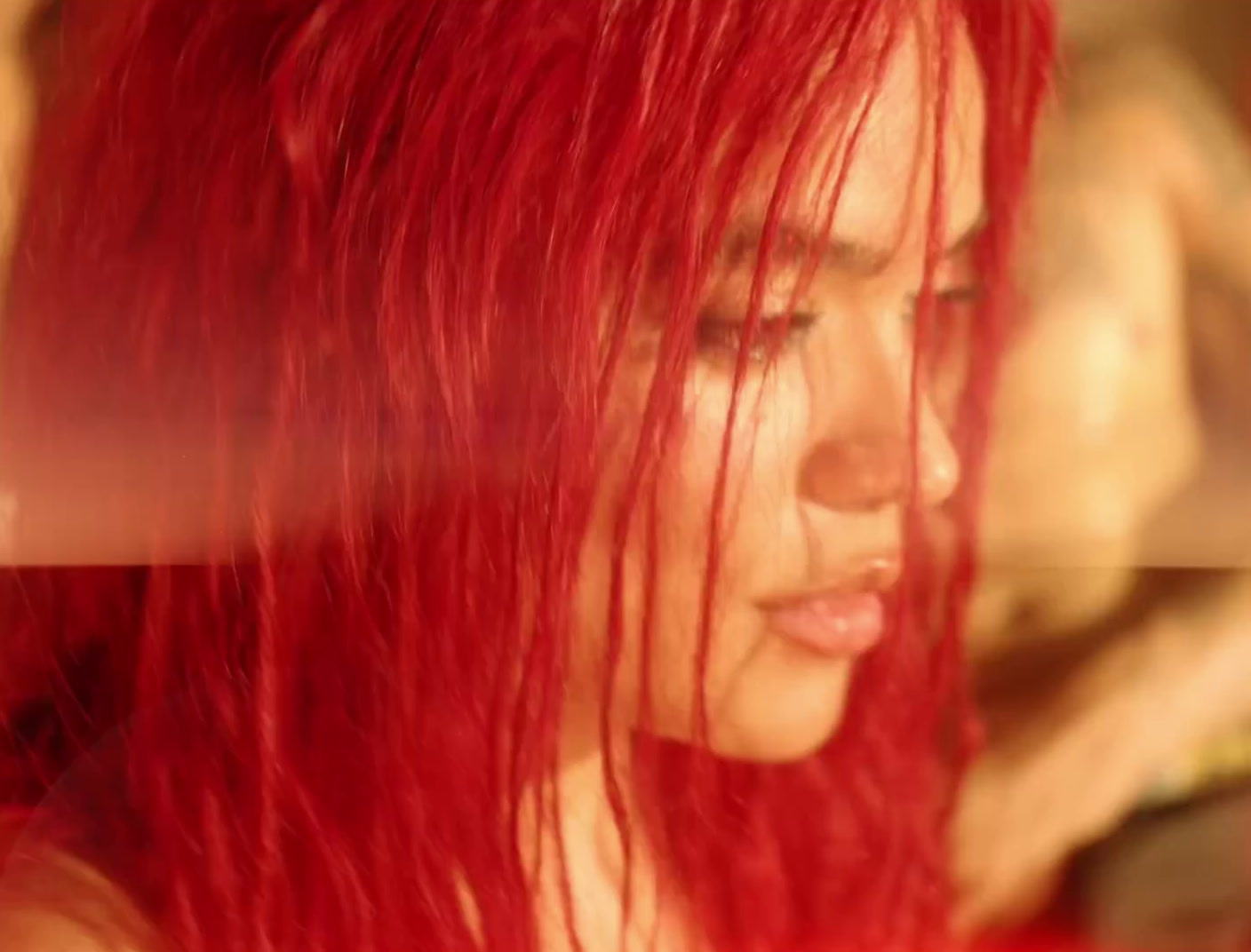 a close up of a woman with red hair