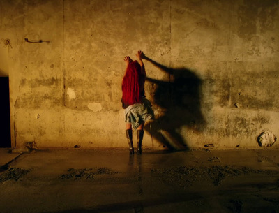 a person standing in front of a wall