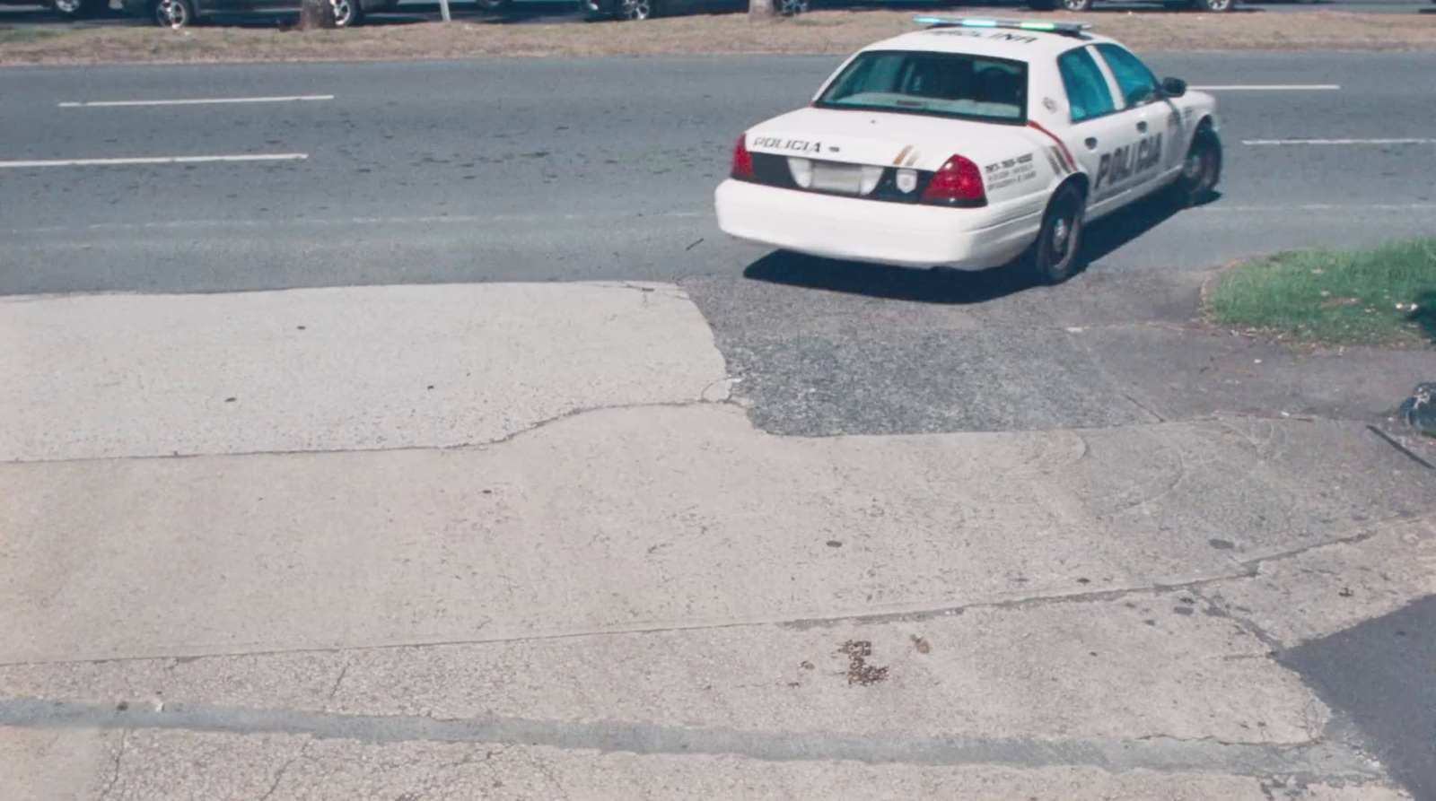 a police car parked on the side of the road