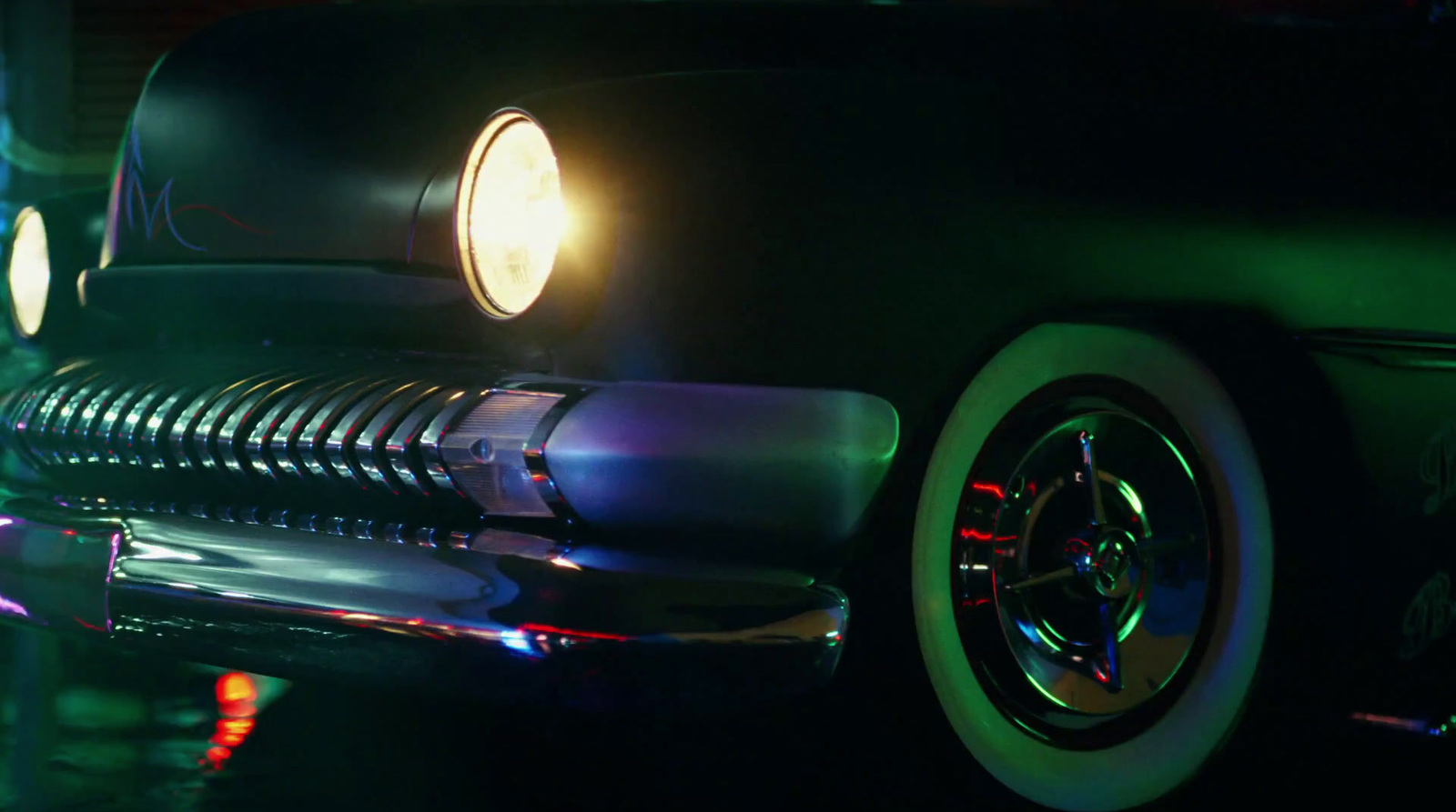 a close up of a car in the dark