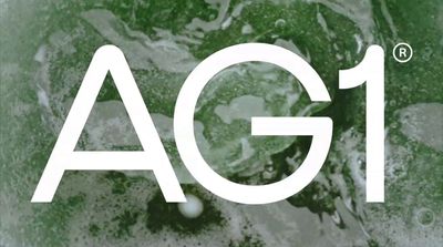 a close up of the word ag1 on a green background