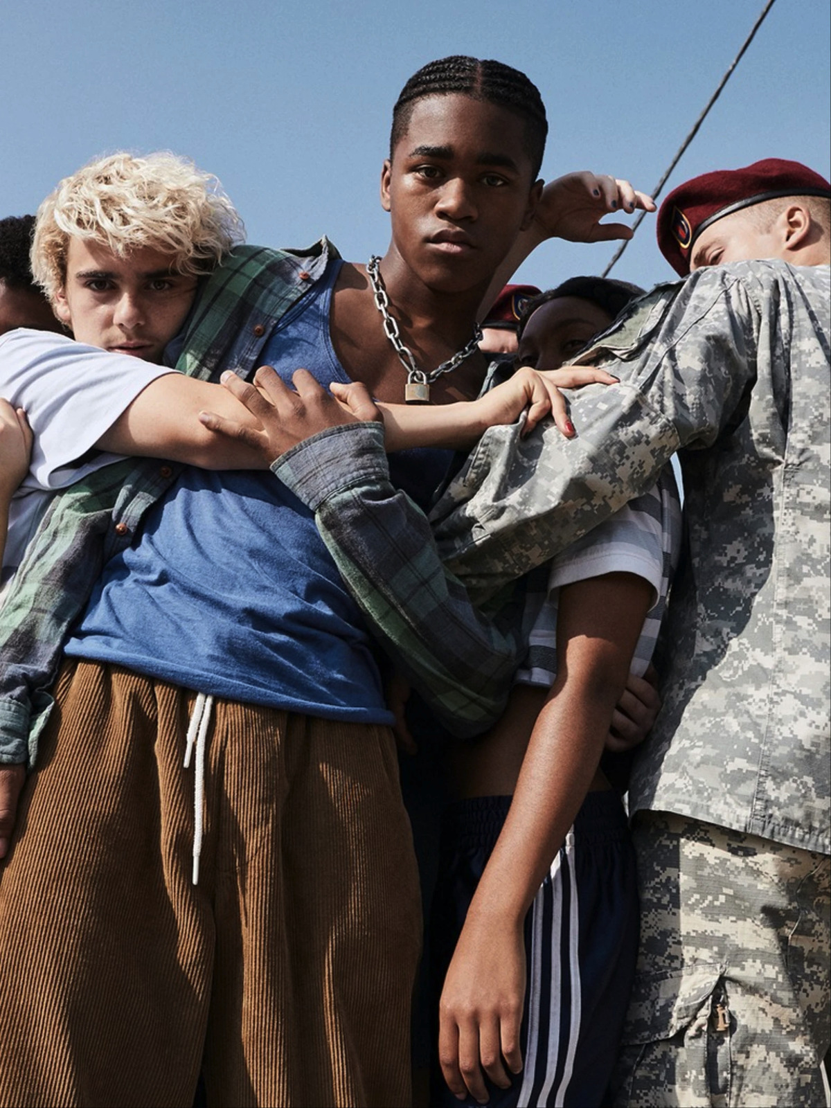 a group of young men standing next to each other