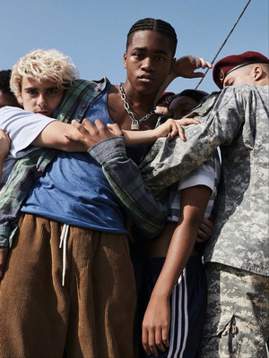 a group of young men standing next to each other