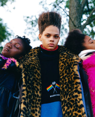 a group of young women standing next to each other