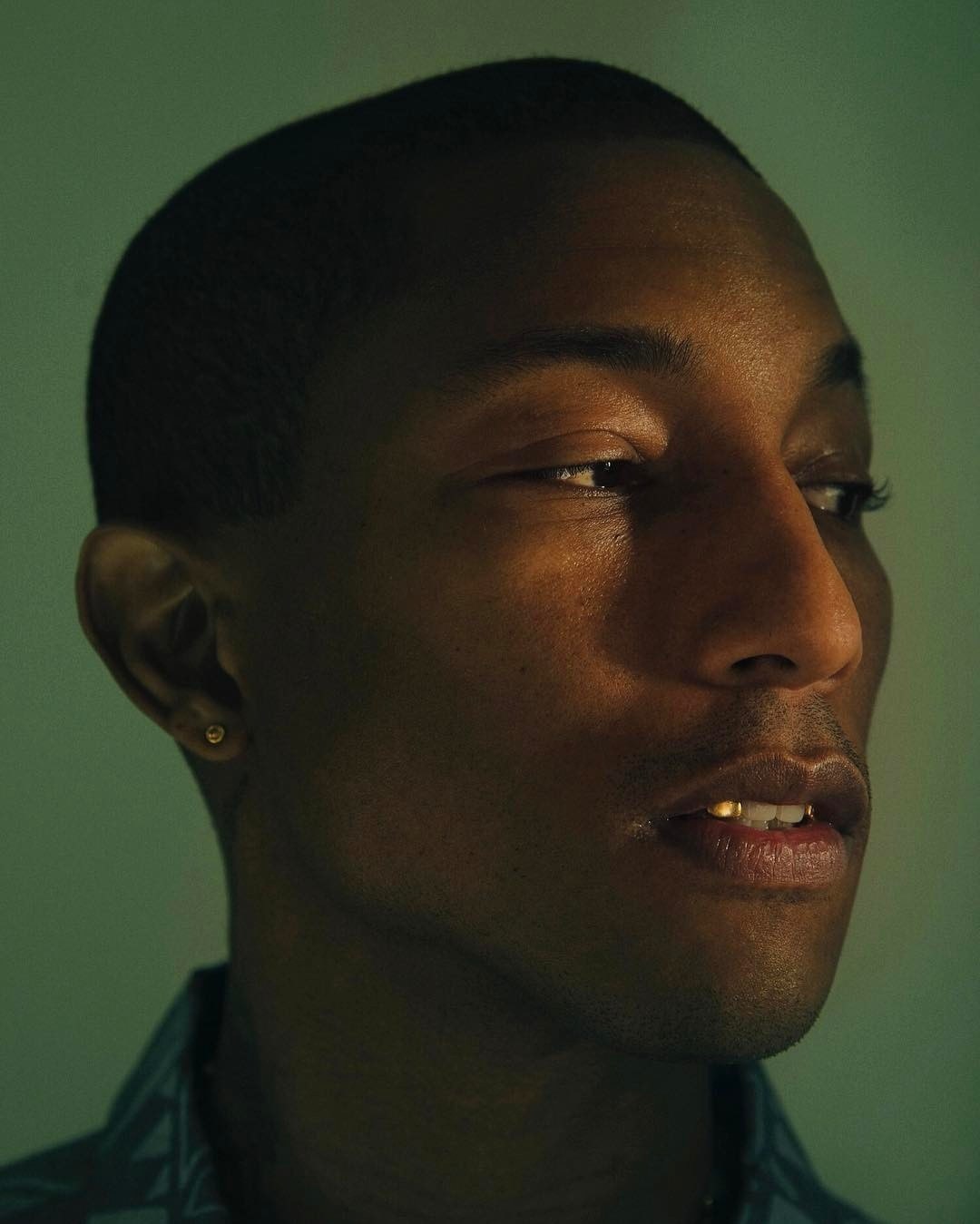 a close up of a person with a toothbrush in his mouth