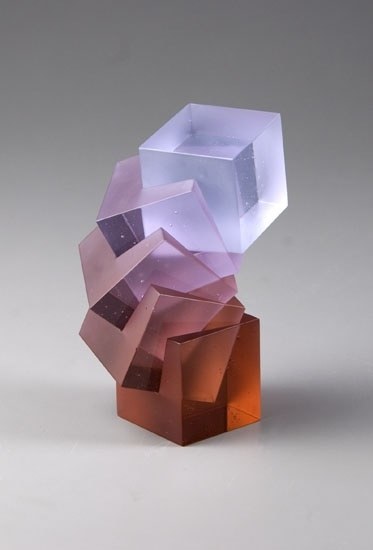 a glass sculpture of a person's head