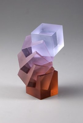 a glass sculpture of a person's head