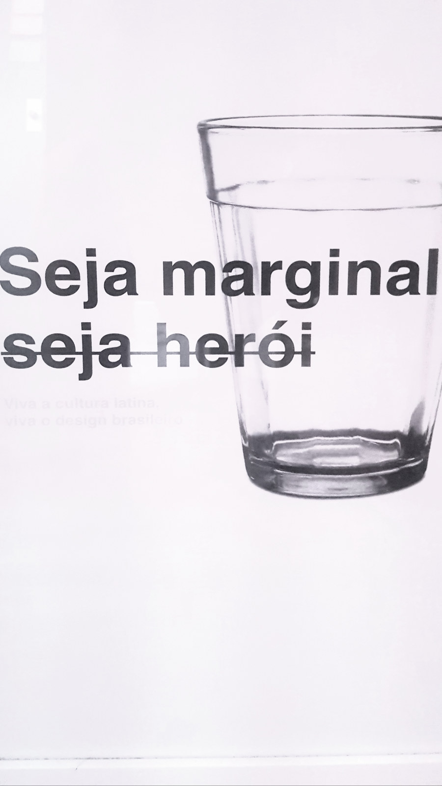 a picture of a glass of water with the words seja marginal seja hero