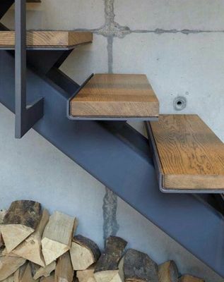 a set of stairs made of wood and metal