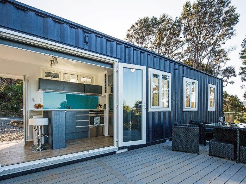 a house made out of a shipping container