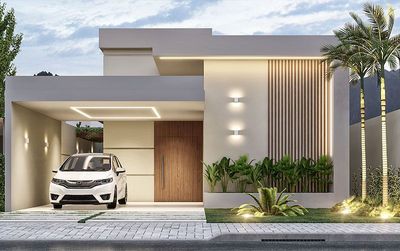 a white car parked in front of a house