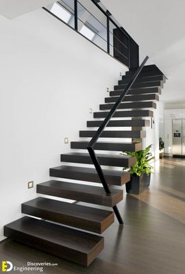 a black and white staircase in a house