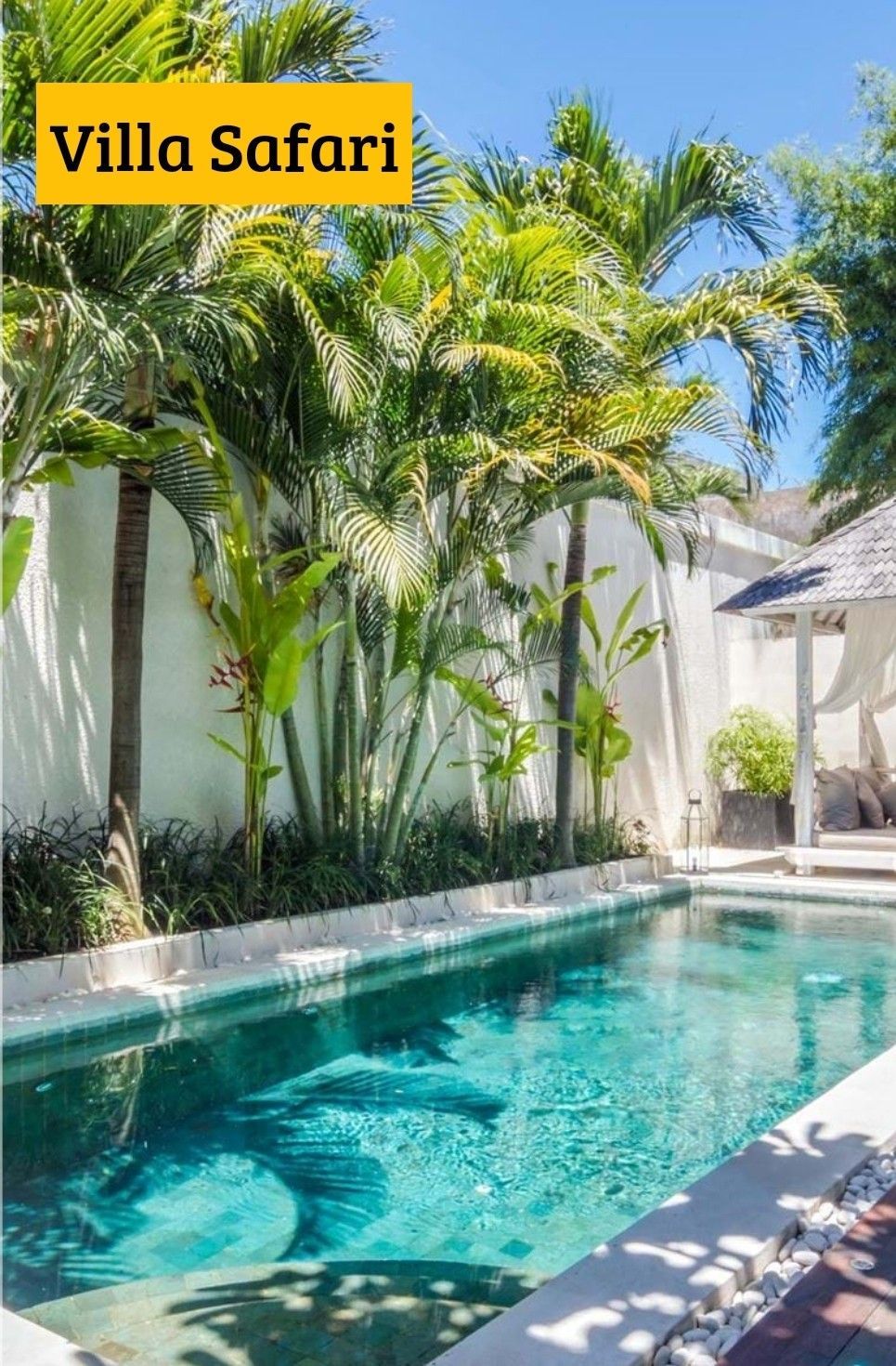 a small pool with a gazebo in the middle of it