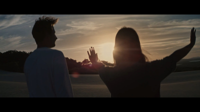 a man and a woman standing next to each other