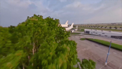 a large jetliner sitting on top of an airport tarmac