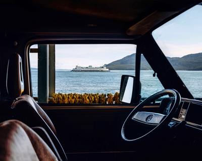 a view of the ocean from inside a vehicle