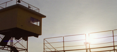 a tall tower with a clock on the top of it