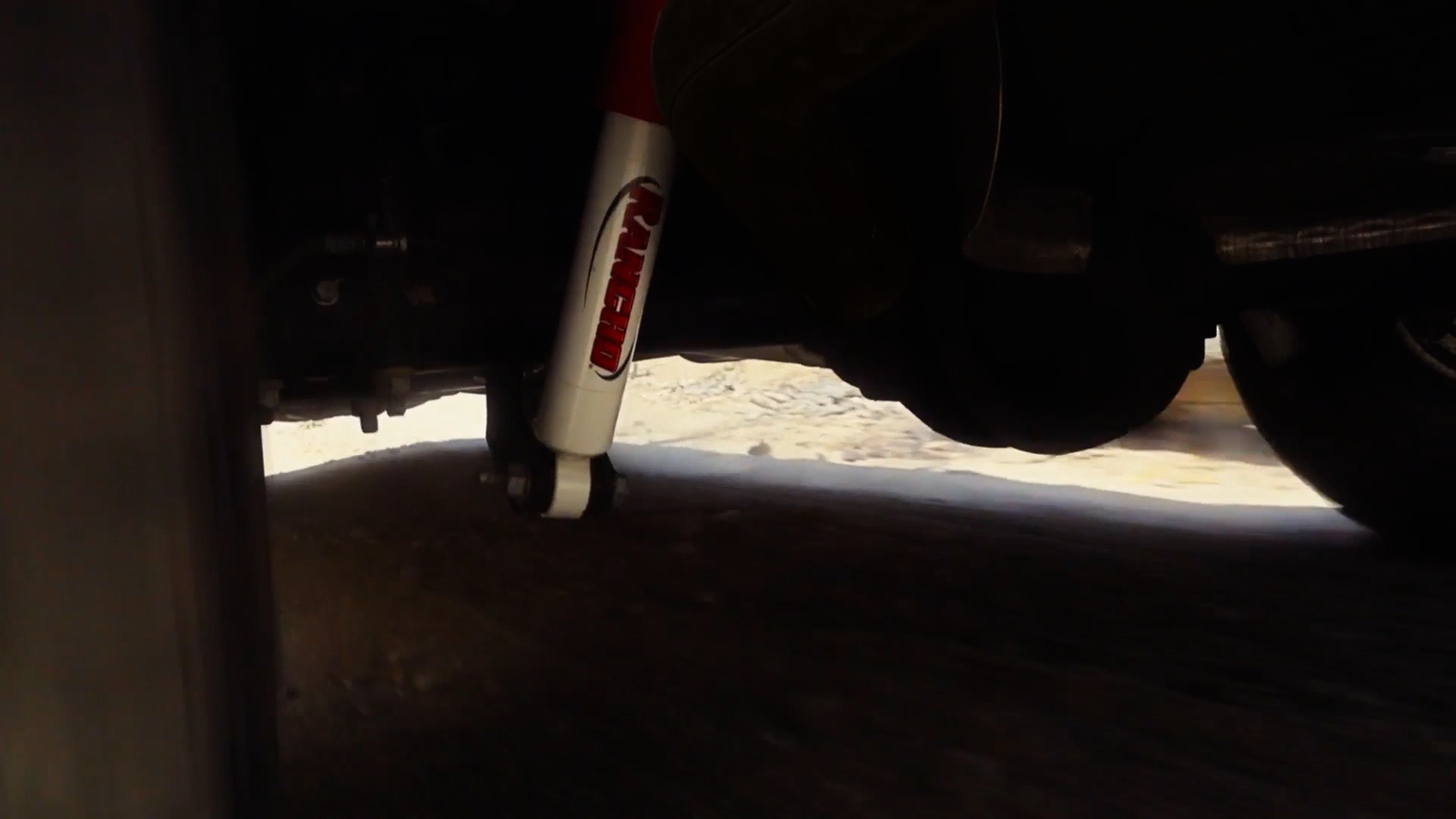 a close up of a bike tire with snow on the ground