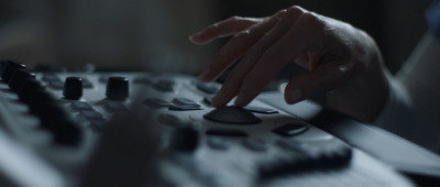 a close up of a person's hand on a keyboard