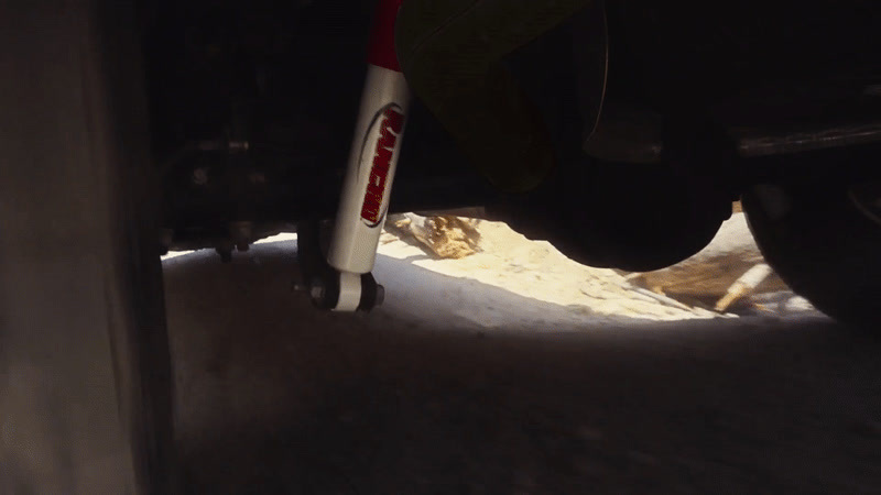 a close up of a bike tire with snow on the ground