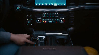 a person is sitting in a car with a radio