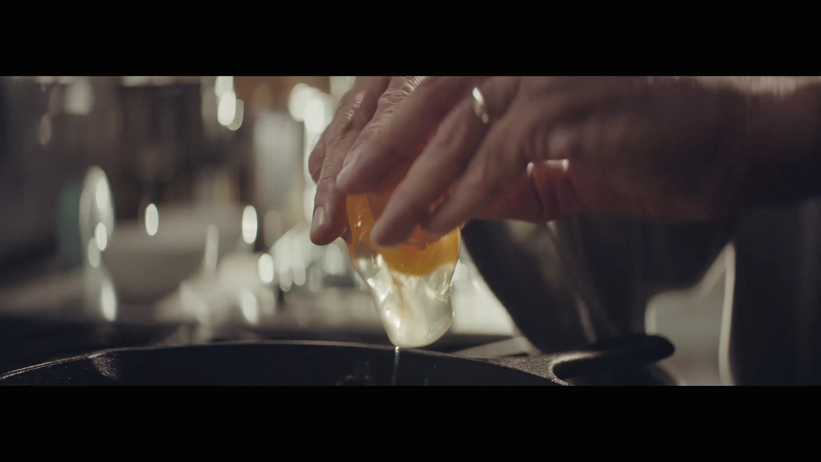 a person is pouring something into a bowl