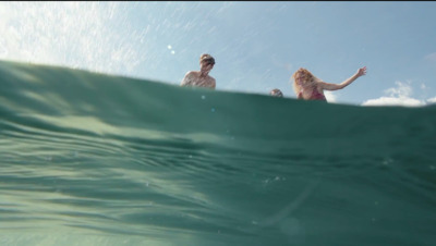 a couple of people that are in the water