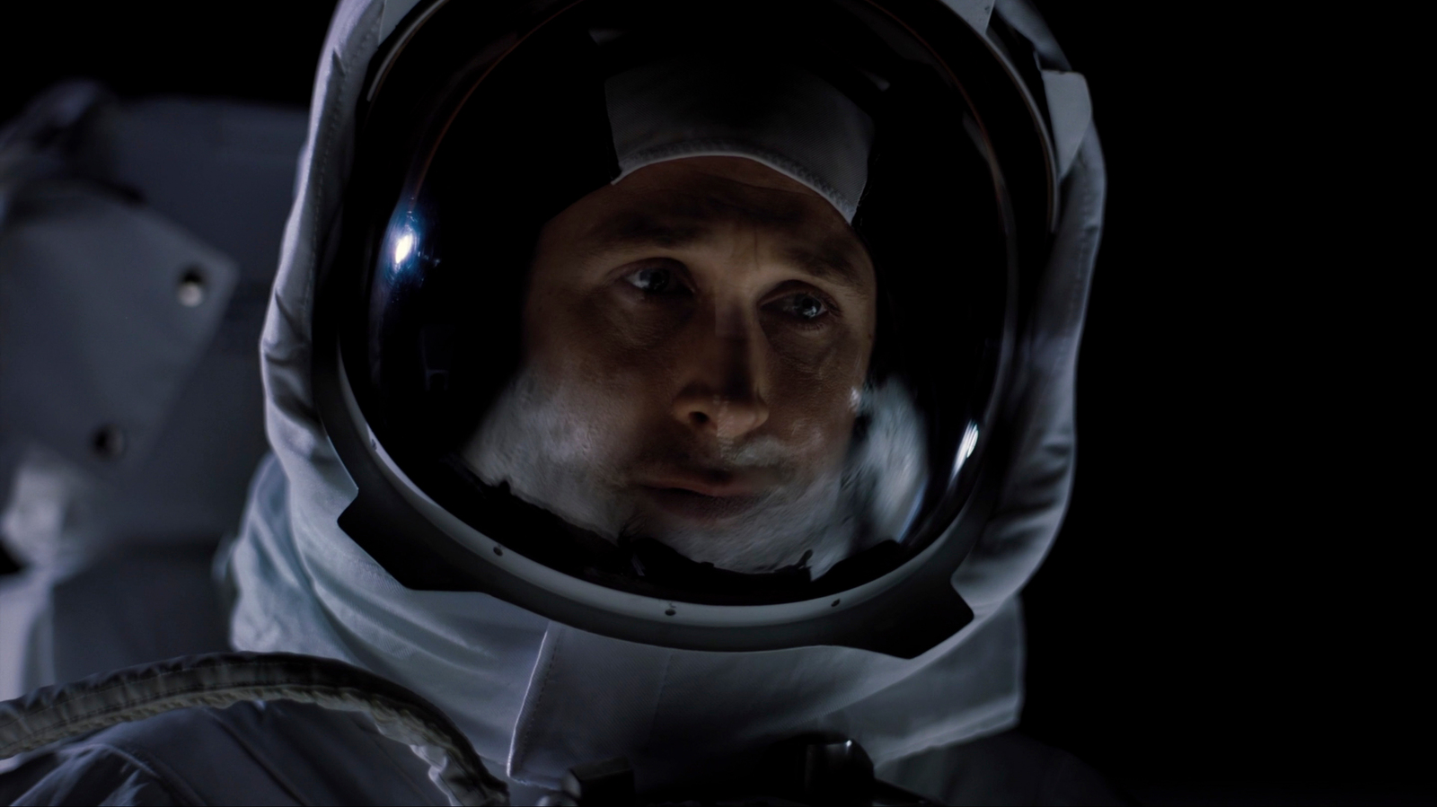 a man in a space suit with a helmet on