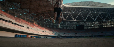 a person jumping in the air on a skateboard