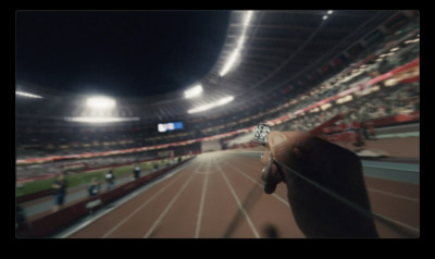 a blurry photo of a person's hand on a track