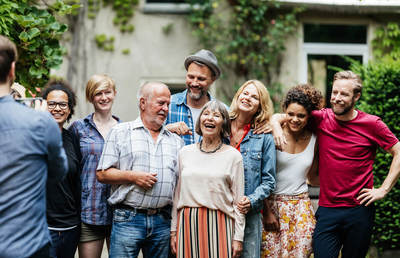 a group of people standing next to each other