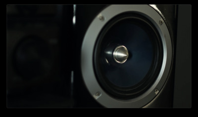 a close up of a speaker with a black background