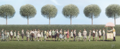 a group of people standing next to each other on a field