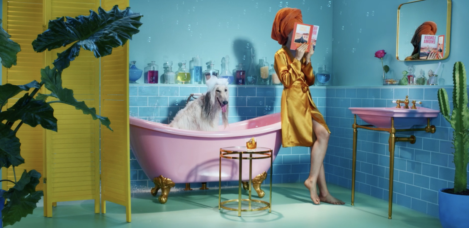 a painting of a woman in a bathtub with a dog