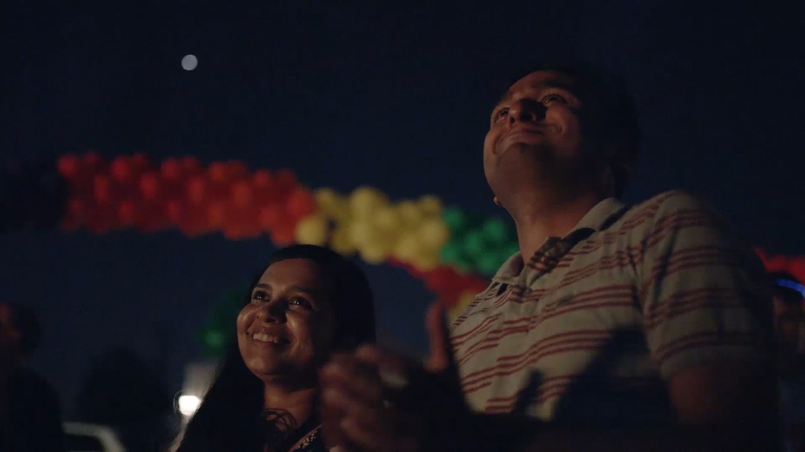 a man and a woman standing next to each other