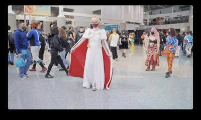 a group of people in costumes standing around