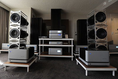 a room filled with speakers and sound equipment