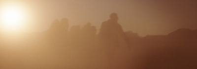 a blurry photo of a person standing in the fog