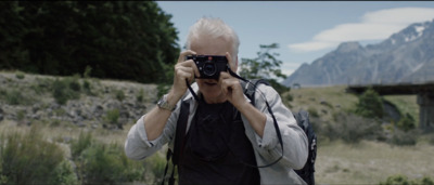 a man taking a picture of himself with a camera