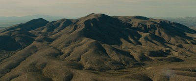 a view of a mountain range from an airplane