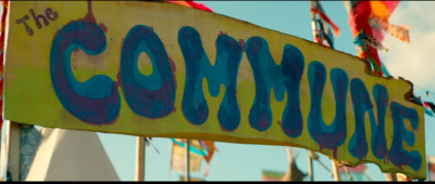 a close up of a street sign with a sky background