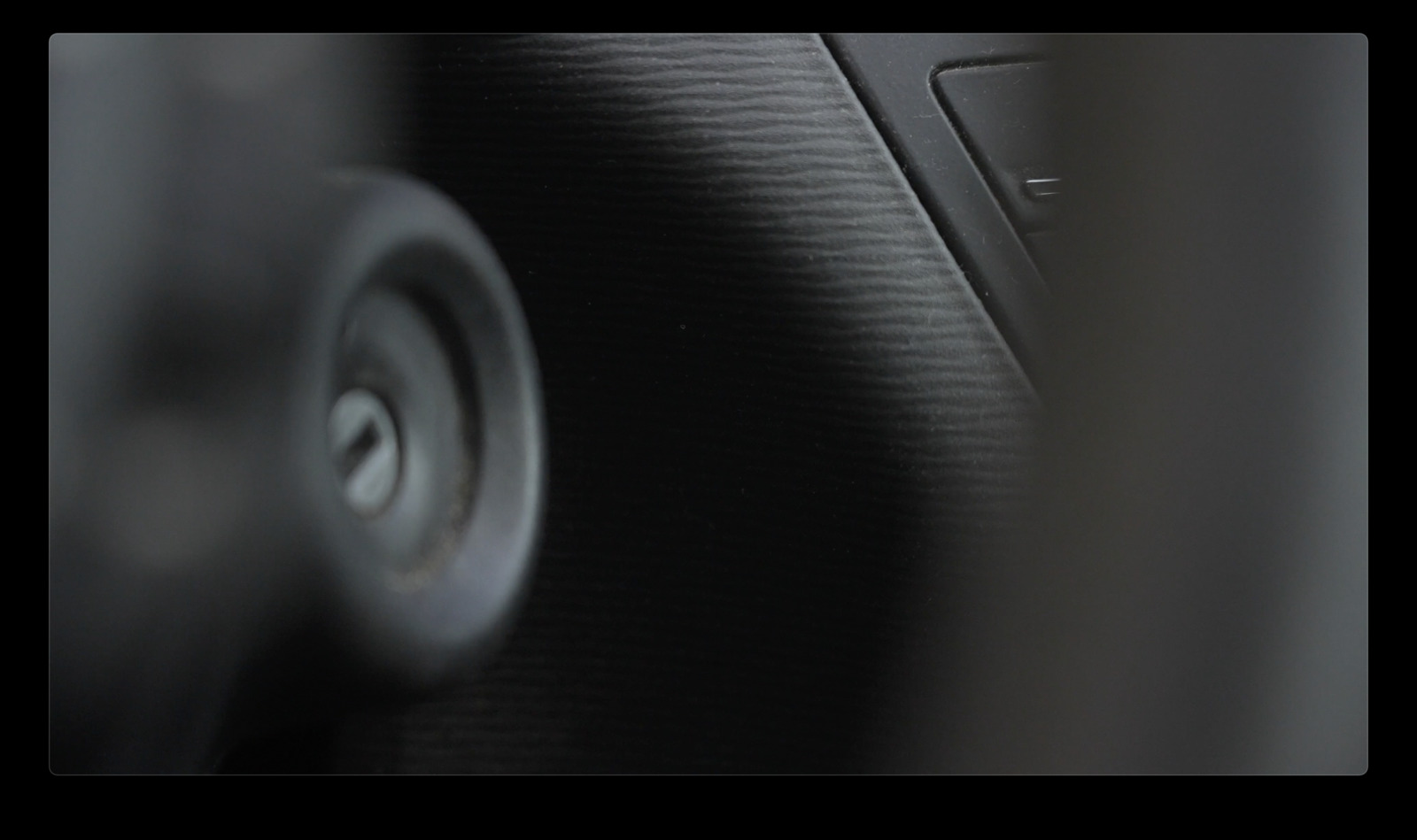 a close up of a speaker with a blurry background