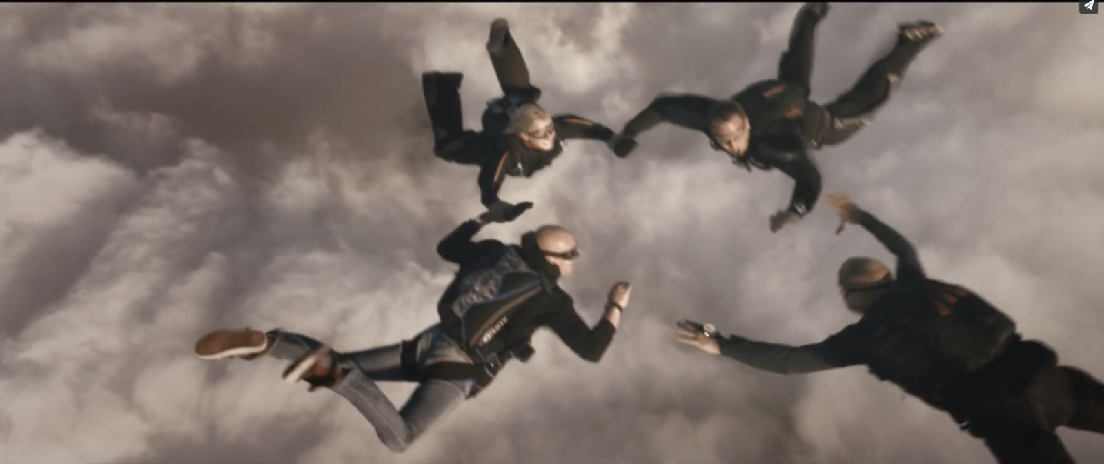 a group of people flying through the air