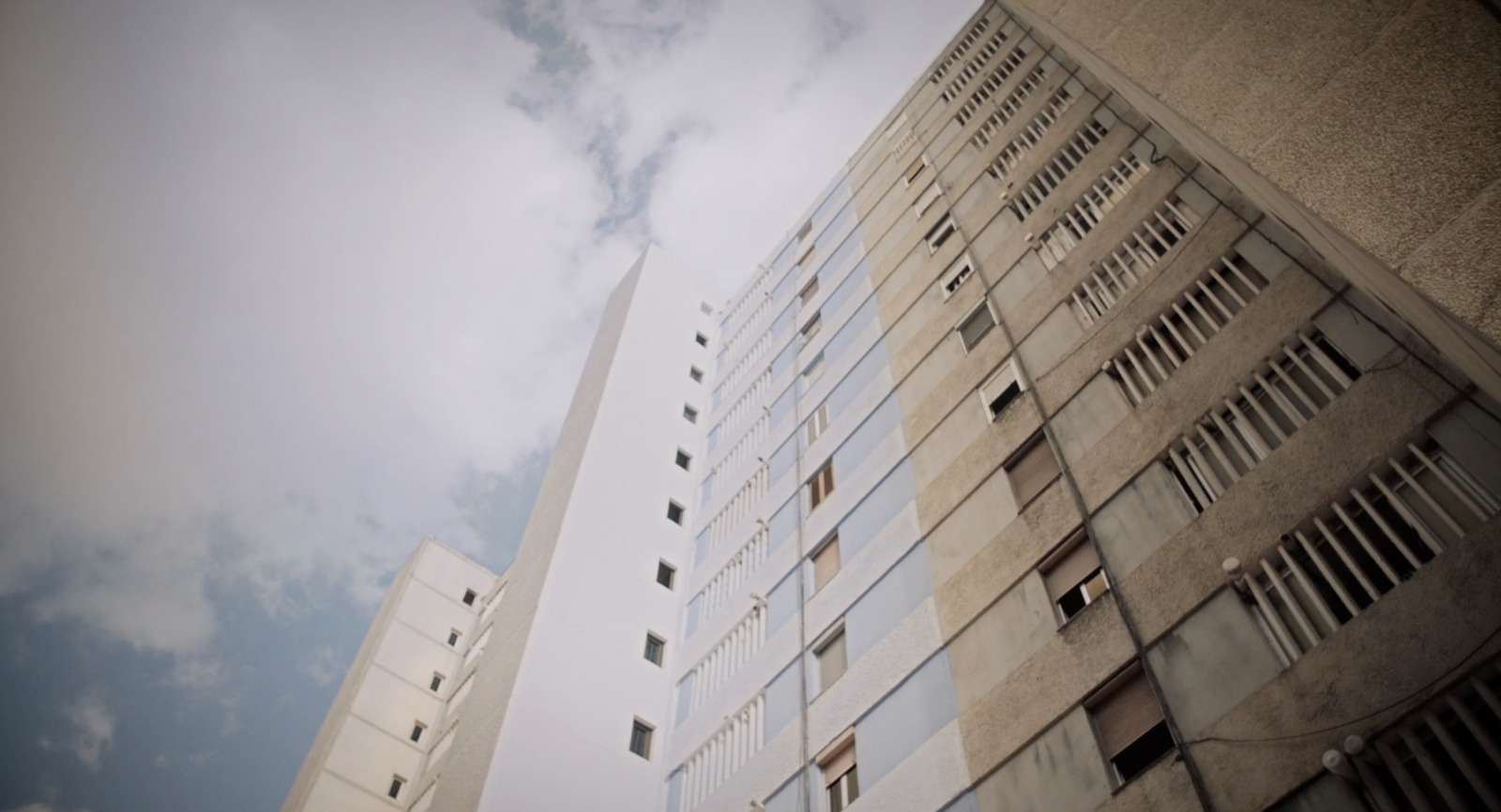 a tall building with a sky background