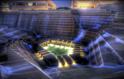 a large pool of water in the middle of a city