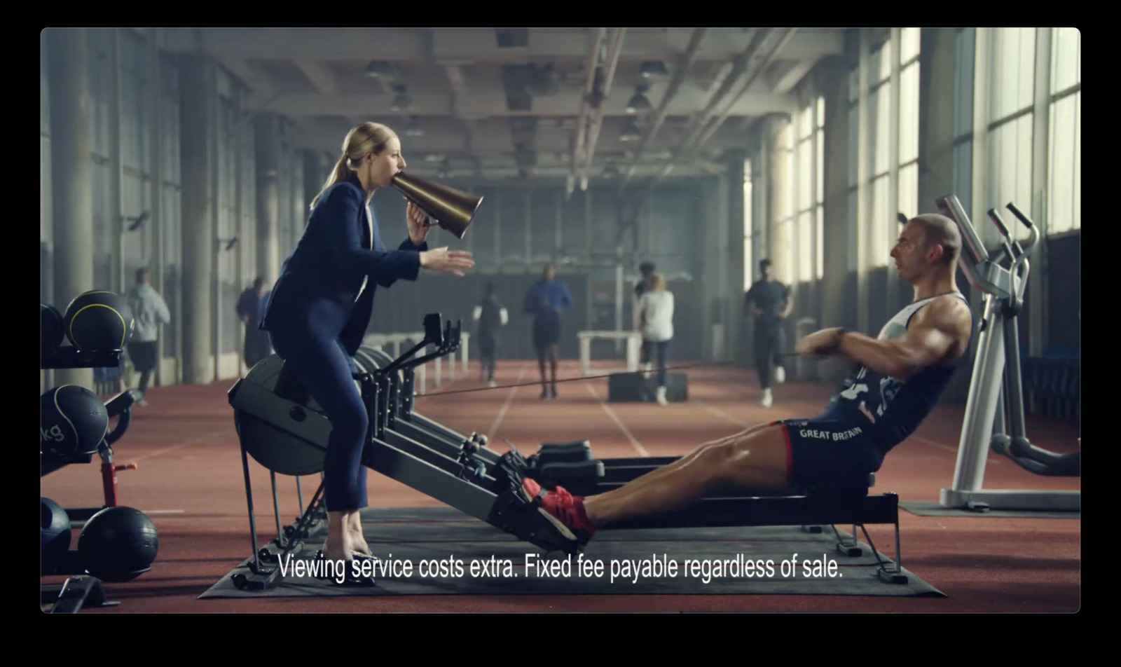 a man and a woman in a gym