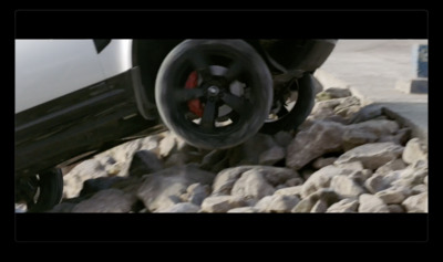 a close up of a tire on a white truck